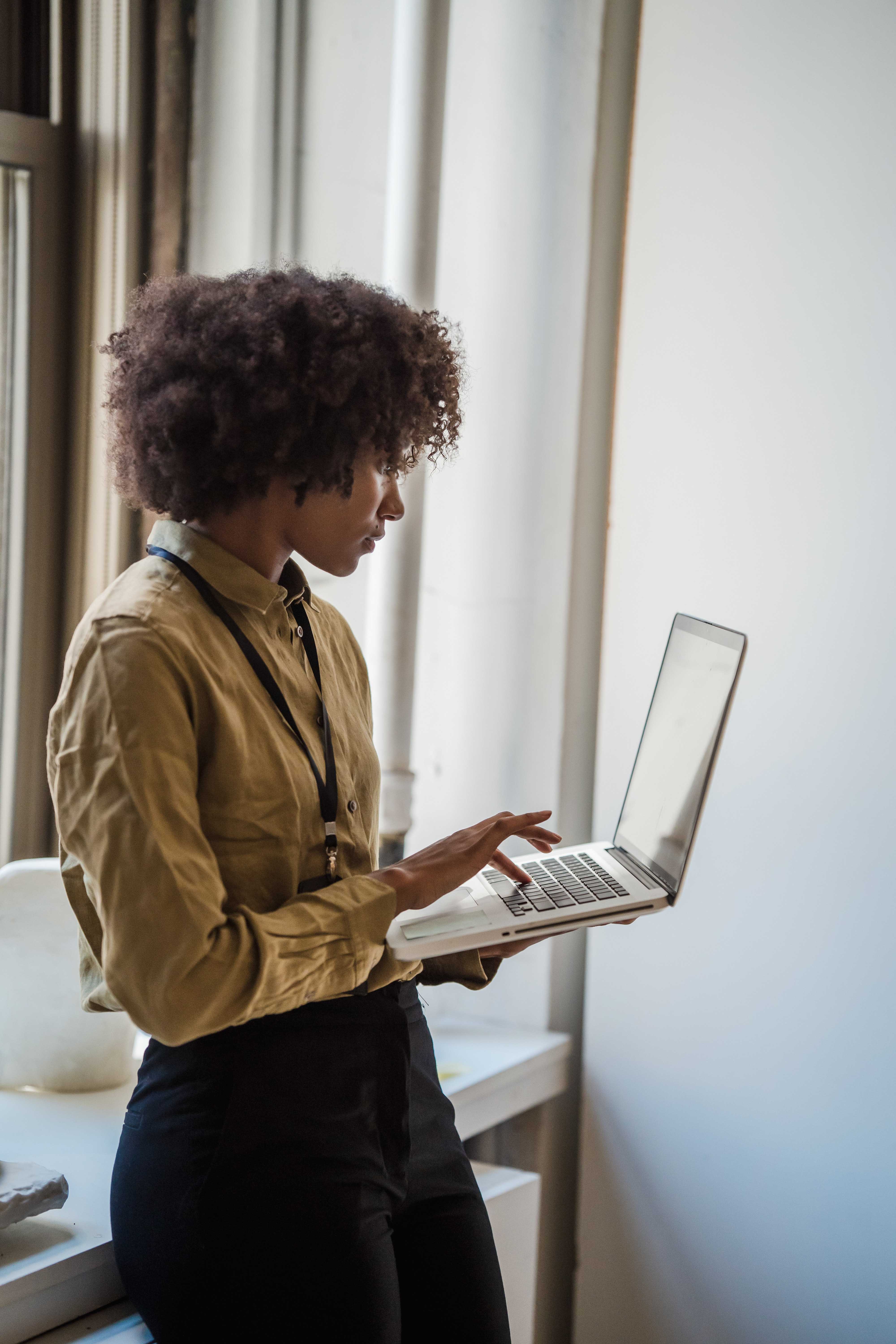 woman looking at Beam desktop platform on computer